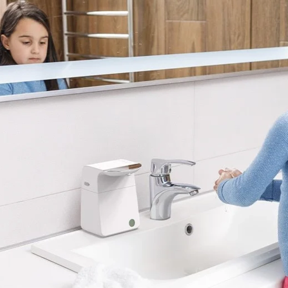 Hand Sanitiser Dispenser Mini in women's bathroom