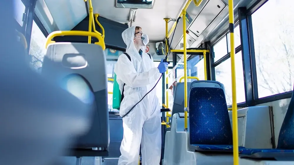 stock-image-specialist-disinfection-bus-transport-fogging-seats-glo_compressed